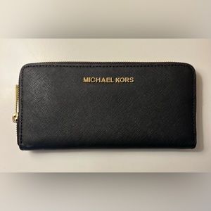 Large zip around Saffiano Leather wallet.